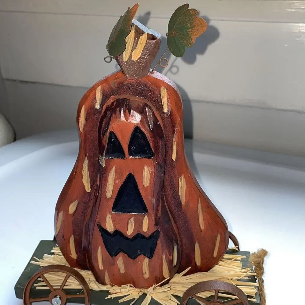 Halloween/Autumn wooden Jack O Lantern on a green wagon rolling decoration‎